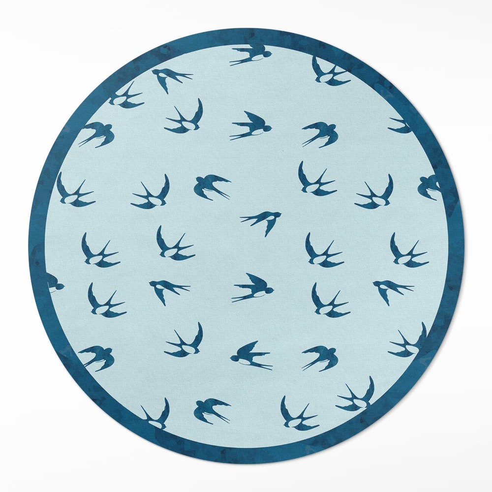 Kulatý vinylový koberec Malé lístky na modrém pozadí