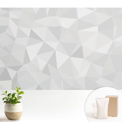 Tapeta na zeď s geometrickým vzorem v šedých odstínech evokující minimalismus