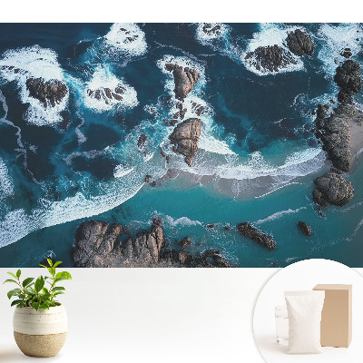 Tapeta na zeď Pohled na oceán s kameny shora v živých barvách