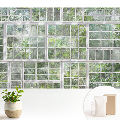 Tapeta do obyvaku Zelená džungle za bílými okny