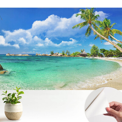 Tapeta s motivem exotické pláže s palmami a zelení