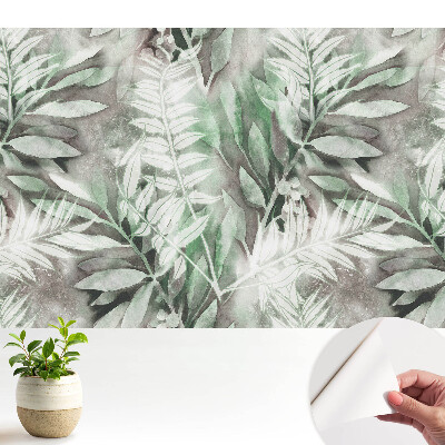 Tapeta na zeď s jemným akvarelovým motivem listů v zelené barvě