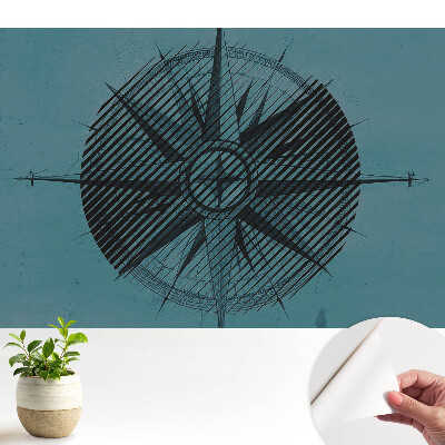 Tapeta s abstraktním kompasem na modrém pozadí