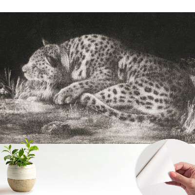 Tapeta do obývacího pokoje s motivem odpočívajícího leoparda v trávě