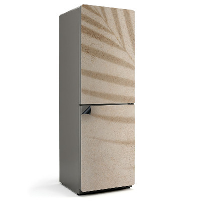 Magnet na ledničku Stíny listí na písčitém pozadí