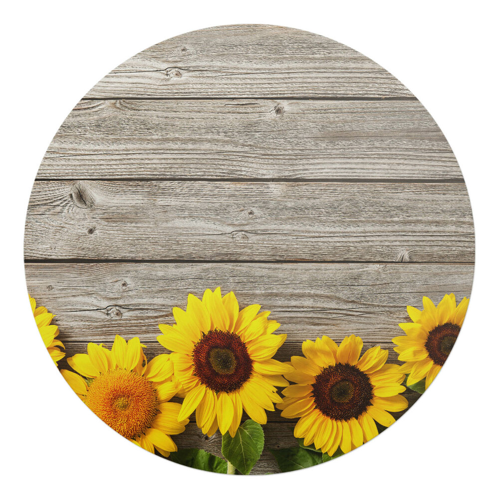 Ochranná podložka pod židli kulatá Slunečnice na dřevěném pozadí