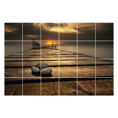 Samolepka na dlaždice Molo nad vodou při západu slunce