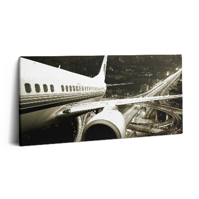 Obraz canvas 100x50 cm Letadlo a město