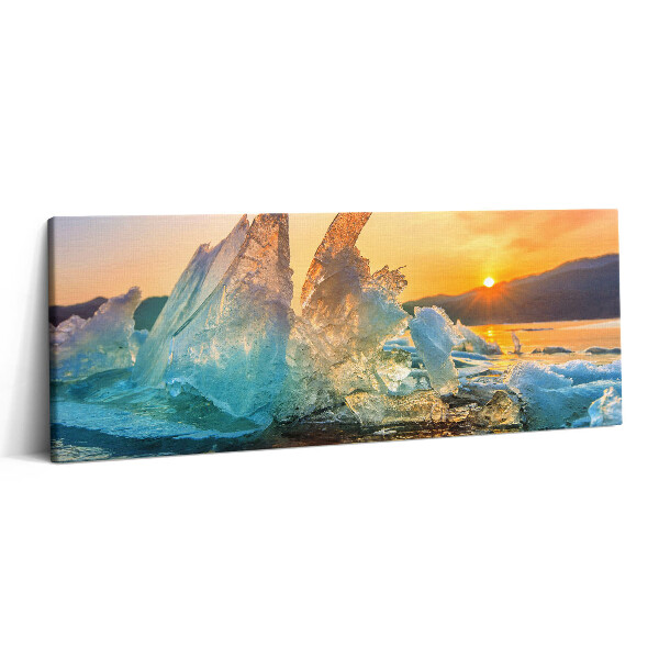 Obraz canvas 125x50 cm Kus ledu při východu slunce