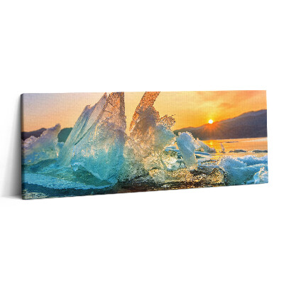 Obraz canvas 125x50 cm Kus ledu při východu slunce