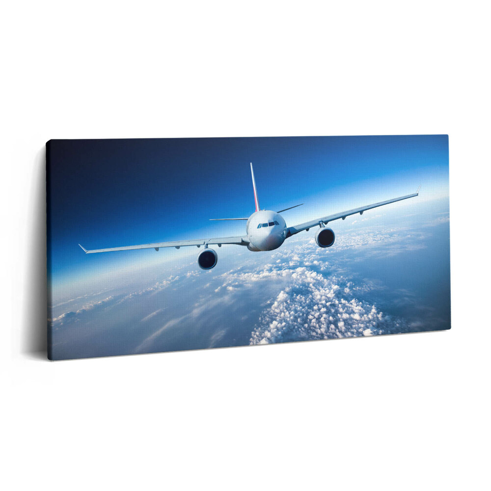 Obraz canvas 140x70 cm Letadlo nad mraky