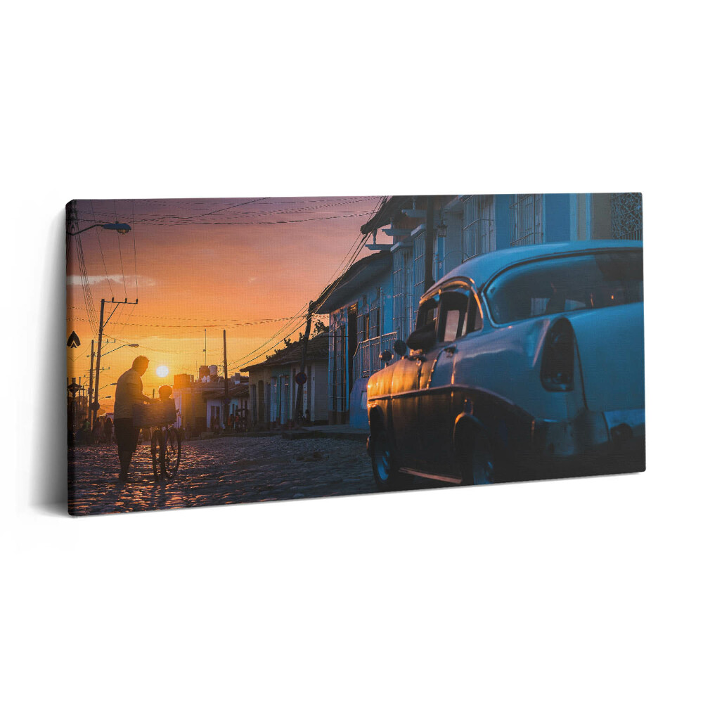 Obraz na plátně 140x70 Západ slunce a staré auto