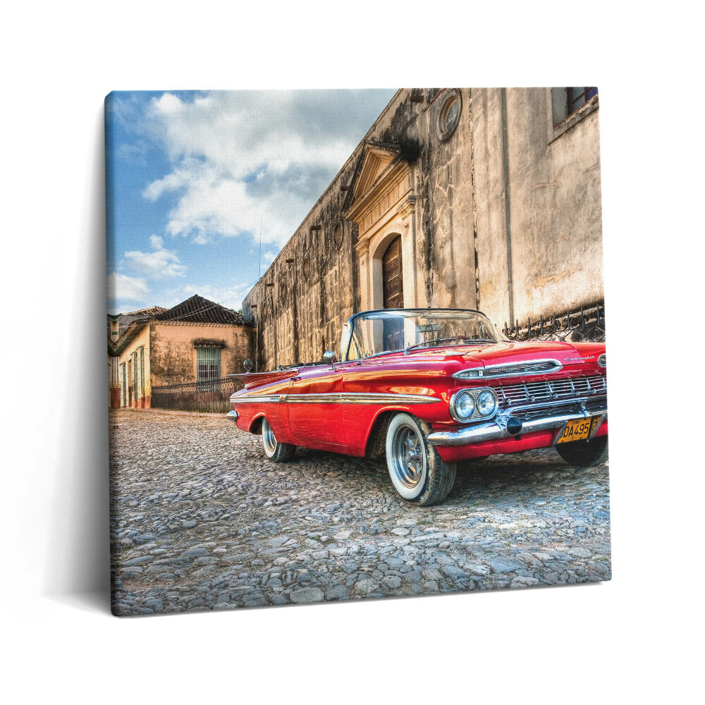 Obraz z fotografie na plátně 60x60 cm Staré červené auto v kolumbijské čtvrti