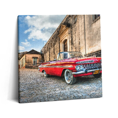 Obraz z fotografie na plátně 60x60 cm Staré červené auto v kolumbijské čtvrti
