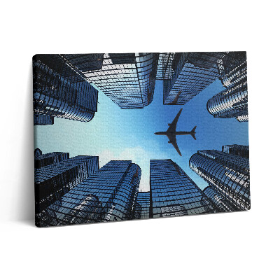 Obraz na plátně 80x60 cm Letadlo nad budovami