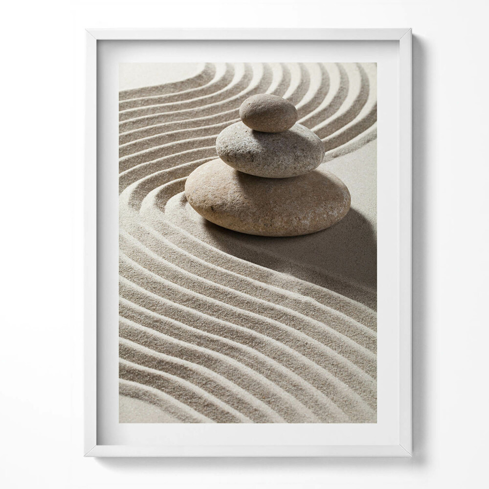 Obraz v rámu Hromada kamenů na zenovém písku