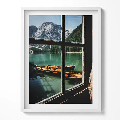 Obraz v rámu Pohled z okna na jezero s lodí