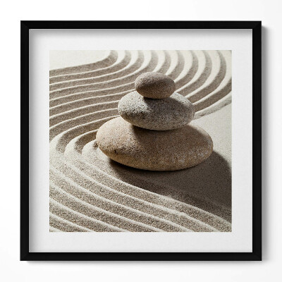 Obraz v rámu efektivní Hromada kamenů na zenovém písku