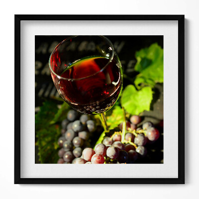 Obraz v rámu efektivní Sklenka červeného vína a hroznů