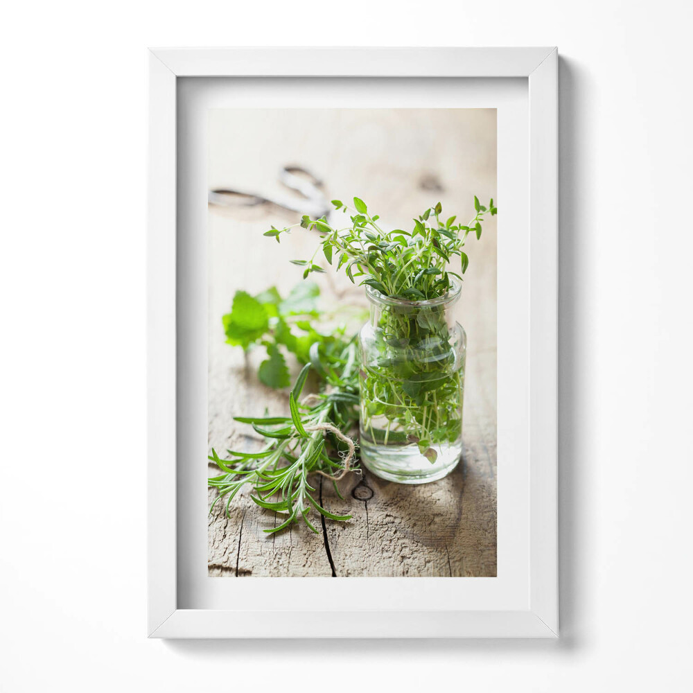 Obraz s rámem elegantní Byliny ve sklenici na dřevo