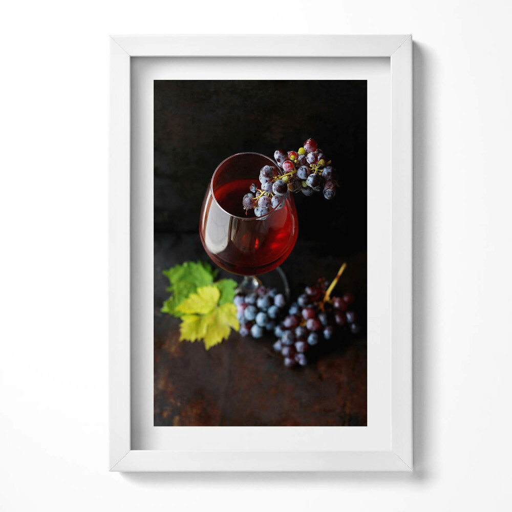 Obraz s rámem elegantní Sklenka vína a hroznů