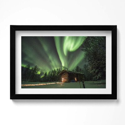 Obraz s rámem dekorativní Polární záře a dům v lese