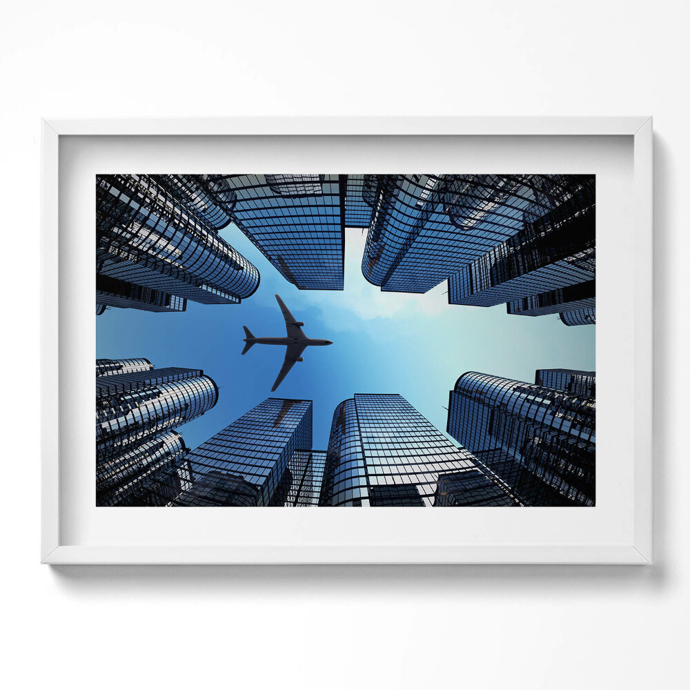 Obraz v rámu moderní Letadlo nad budovami